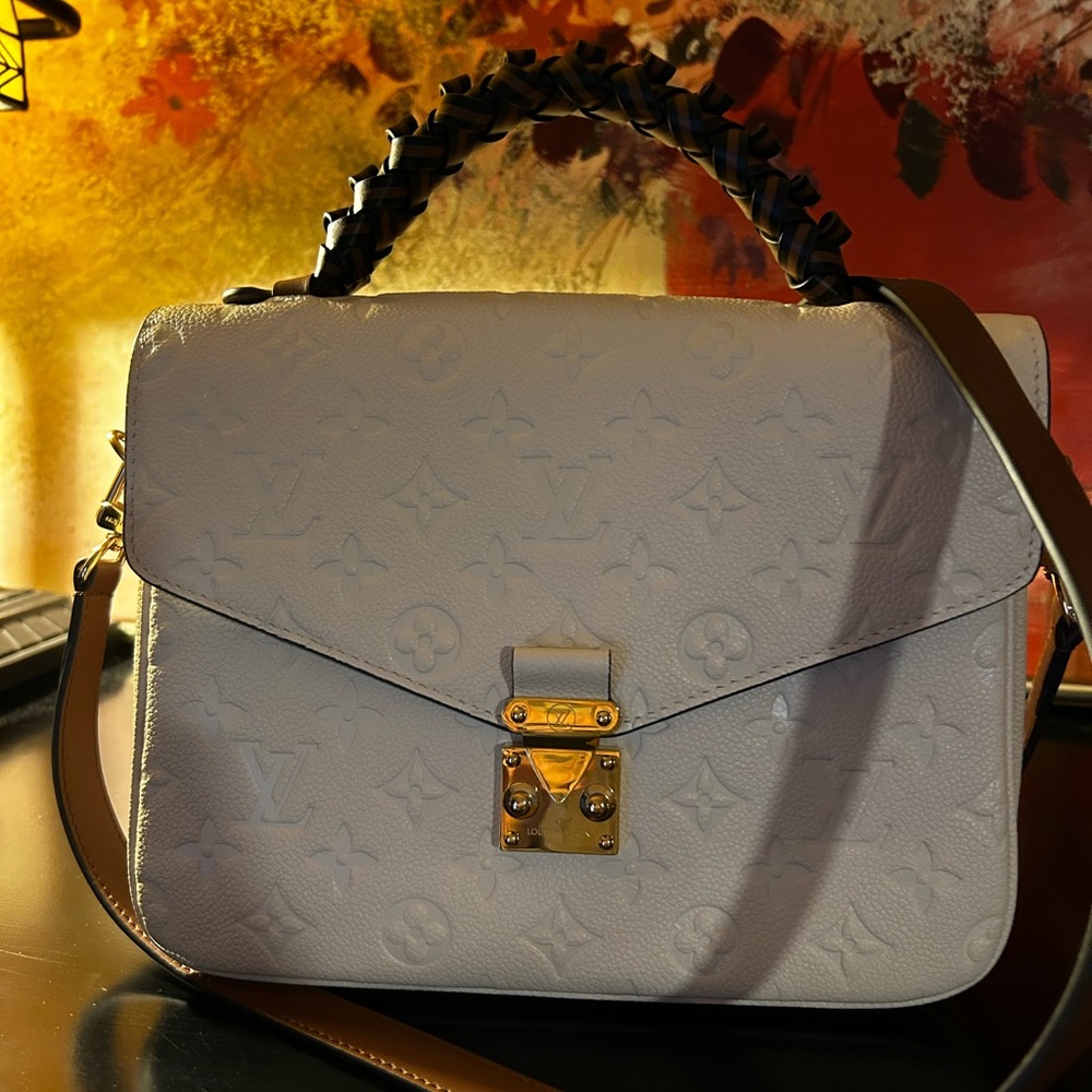 Pouchette Métis Empriente Handbag
